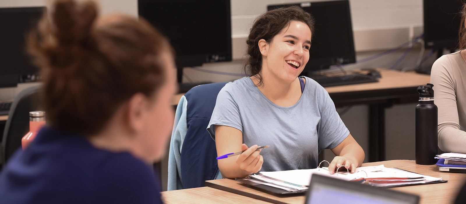 Student smiling in class
