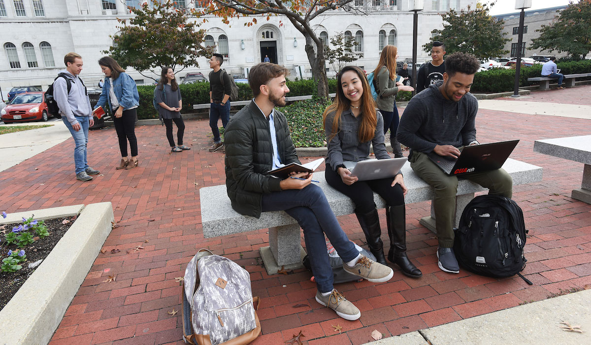 students outside the library