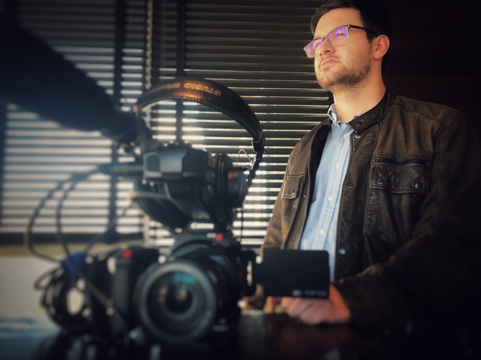 Student filming on campus